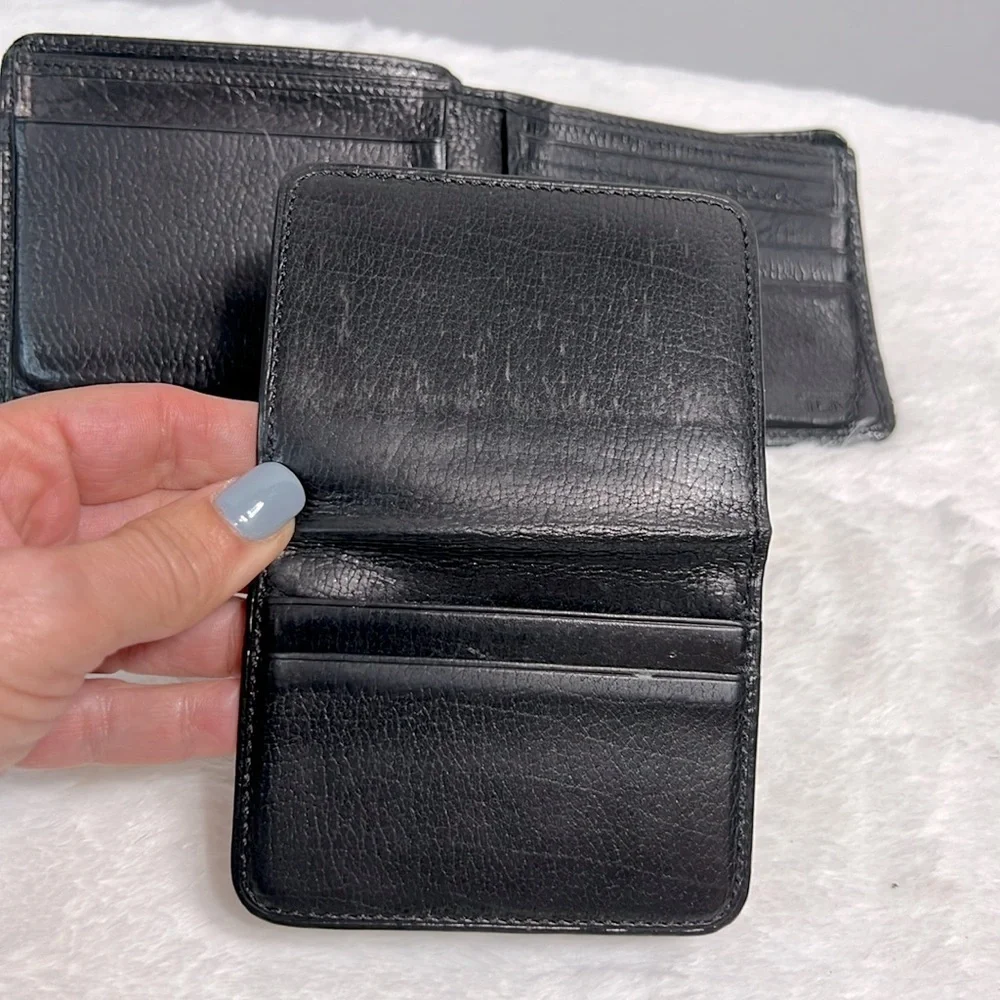 Tumi black leather